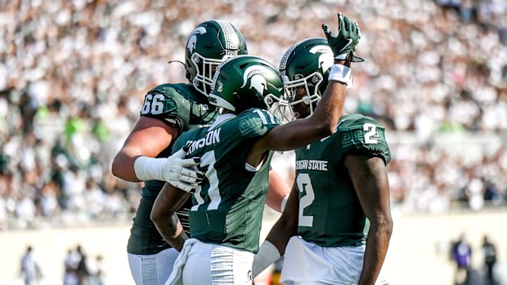 Michigan State's Aziah Johnson, left, celebrates his touchdown with Aidan Chiles during the first quarter in the game against Prairie View A&M on Saturday, Sept. 14, 2024, at Spartan Stadium in East Lansing.