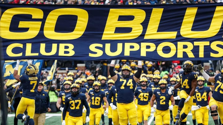 Michigan players jump up to touch the banner as they take the field for the Ohio State game at Michigan Stadium, Saturday, Nov. 30, 2019.

Go Blue Michigan Flag