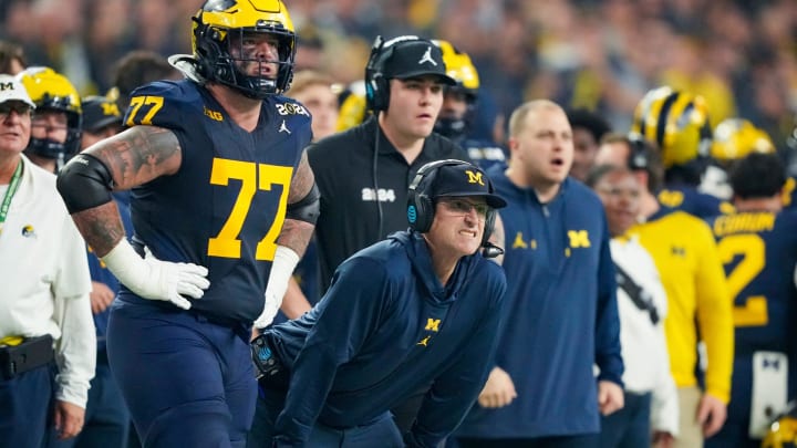 Michigan head coach Jim Harbaugh watches from the sideline in the second quarter during the College Football Playoff national championship game against Washington at NRG Stadium in Houston, Texas on Monday, Jan. 8, 2024.