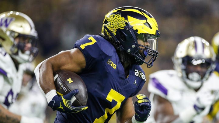 Michigan running back Donovan Edwards runs against Washington during the second half of U-M's 34-13 win in the College Football Playoff national championship game in Houston on Monday, Jan. 8, 2024.