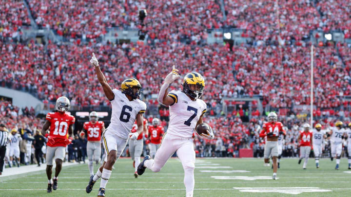 Michigan running back Donovan Edwards (7) runs for a touchdown against Ohio State during the second half at Ohio Stadium in Columbus, Ohio, on Saturday, Nov. 26, 2022.

Syndication The Indianapolis Star