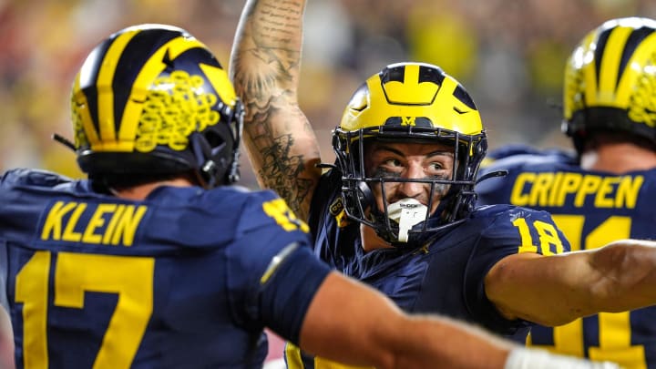 Michigan tight end Colston Loveland (18) celebrates his touchdown against Fresno State during the second half at Michigan Stadium in Ann Arbor on Saturday, Aug. 31, 2024.