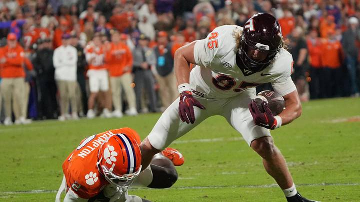 Clemson corner back Ashton Hampton (2) tackles Virginia Tech Hokies tight end Luke Reynolds (85) during the first quarter at Memorial Stadium Saturday, October 24, 2026.