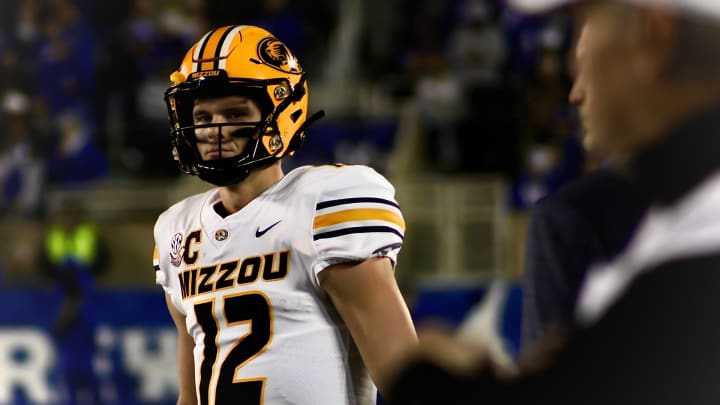 Oct14, 2023; Lexington, Kentucky, USA; Missouri Tigers quarterback Brady Cook (12) looks on at the sideline during the first half against the Kentucky Wildcats at Kroger Field.