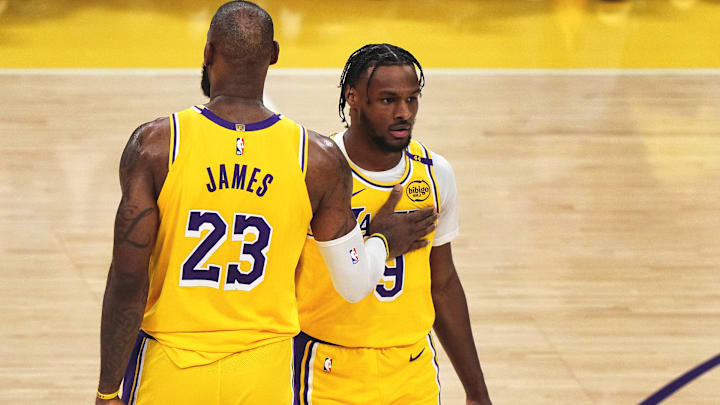 LeBron James and Bronny James share the court for the Los Angeles Lakers on Tuesday as the first father-son duo to accomplish the feat in NBA history. LeBron James and Bronny James share the court for the Los Angeles Lakers on Tuesday as the first father-son duo to accomplish the feat in NBA history.