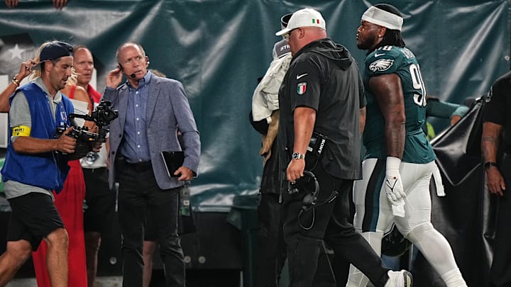 Big Dom escorted Jalen Carter to the locker room after his ejection on Thursday night. Big Dom escorted Jalen Carter to the locker room after his ejection on Thursday night.