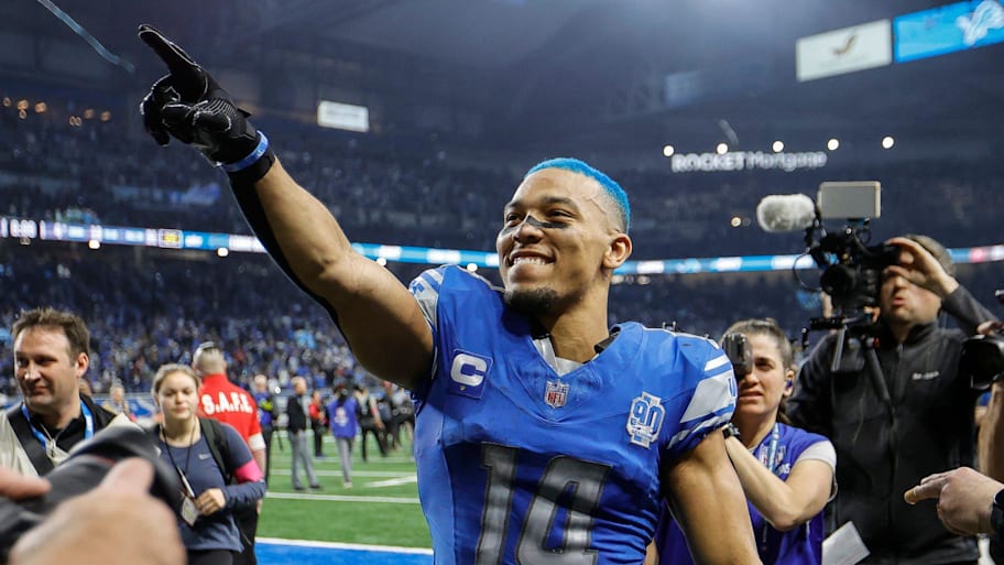 Amon-Ra St. Brown celebrates the Lions' 2023 playoff win over the Buccaneers. | Junfu Han / USA TODAY NETWORK via Imagn Images