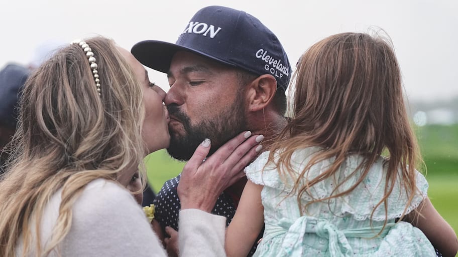 J.J. Spaun celebrates with his wife and two young daughters after winning the U.S. Open