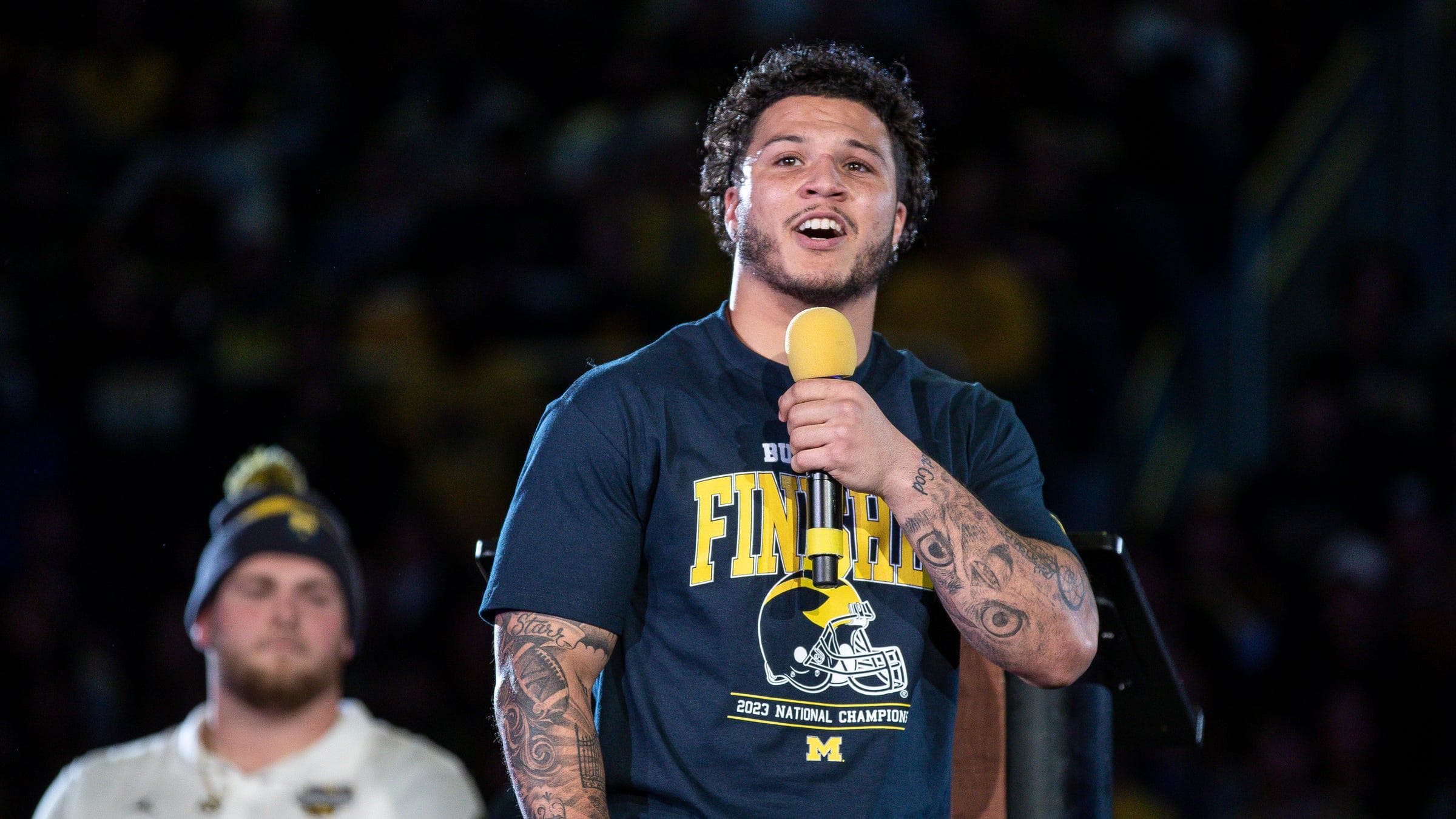 Michigan running back Blake Corum speaks during the national championship celebration at Crisler Center.