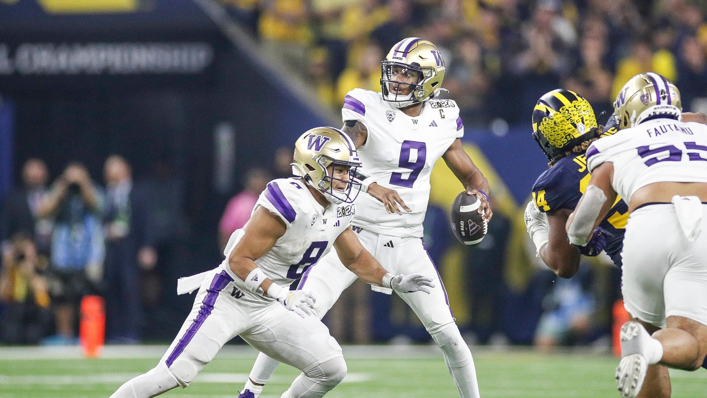 Washington quarterback Michael Penix Jr. looks to pass against Michigan during the first half of the national championship.