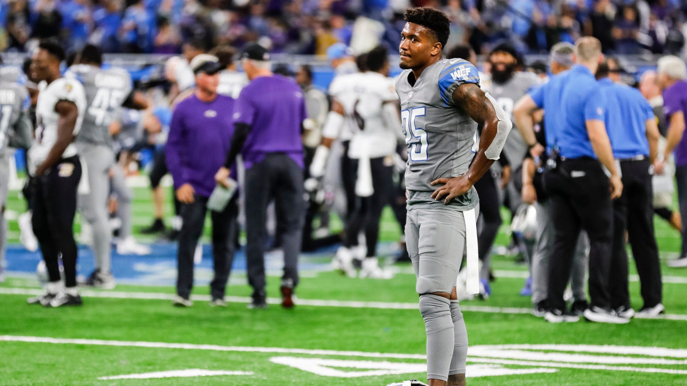 Lions safety Will Harris stands on the field after the Lions' 19-17 loss at Ford Field.
