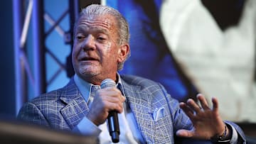 Colts owner Jim Irsay talks to Jeff Saturday during the Colts Town Hall Meeting with their fans and