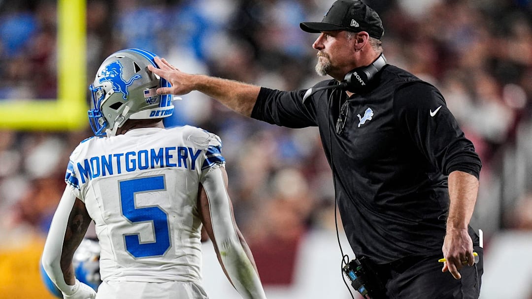 Detroit Lions head coach Dan Campbell celebrates a 2-point conversion against the Washington Commanders, scored by running back David Montgomery during the first half at Northwest Stadium in Landover, Md. on Sunday, Nov. 9, 2025.