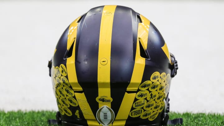 A Michigan football helmet on the sideline during open practice at NRG Stadium in Houston, Texas on Saturday, Jan. 6, 2024.