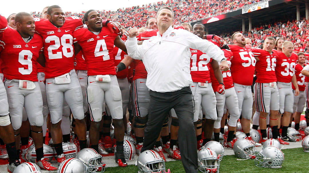 Ohio State Buckeyes head coach Urban Meyer gives a fist pump to the student section following the Buckeyes' 29-22 win over Purdue in the NCAA football game at Ohio Stadium in Columbus on Saturday, Oct. 20, 2012. (Dispatch photo by Adam Cairns)
