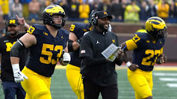 Michigan football coach Sherrone Moore celebrates a play during first-half action between Michigan and Minnesota at Michigan Stadium in Ann Arbor on Saturday, Sept. 28, 2024.