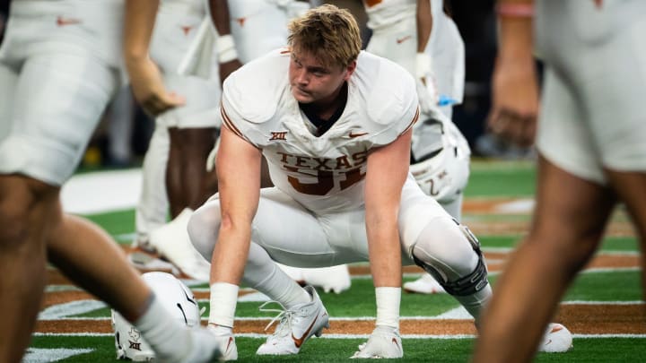 Texas defensive end Ethan Burke (91) warms up ahead of the Big 12 Conference Championship game at AT&T Stadium in Arlington, Texas, Saturday, Dec. 2, 2023