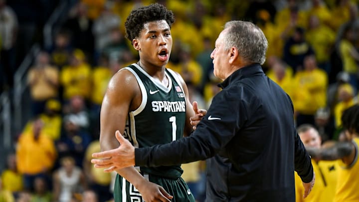 Michigan State's Jeremy Fears Jr. talks with head coach Tom Izzo