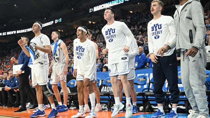 Mar 21, 2024; Omaha, NE, USA; The Brigham Young Cougars bench reacts as their team makes a run in the second half during the first round of the NCAA Tournament at CHI Health Center Omaha.