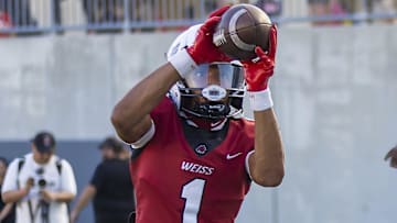 Weiss receiver Adrian Wilson (1) warms up before taking on Temple in a Texas District 12-6 showdown on Friday, Sept 29, 2023.