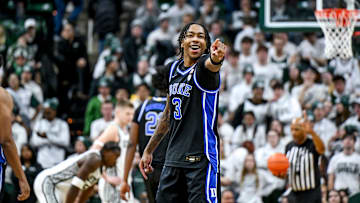 Duke basketball wing Isaiah Evans taunts the Izzone late in the second half in the game against Michigan State on Saturday, Dec. 6, 2025, at the Breslin Center in East Lansing.