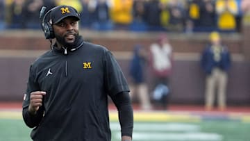 Michigan football coach Sherrone Moore celebrates a play during first-half action between Michigan and Minnesota at Michigan Stadium in Ann Arbor on Saturday, Sept. 28, 2024.