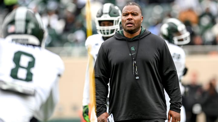 Michigan State's assistant head coach Keith Bhonapha works with the running backs during the Spring Showcase on Saturday, April 20, 2024, at Spartan Stadium in East Lansing.