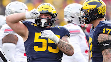 Nov 25, 2023; Ann Arbor, MI, USA;  Michigan defensive lineman Mason Graham celebrates a tackle against Ohio State during the second half at Michigan Stadium in Ann Arbor on Saturday, Nov. 25, 2023. Mandatory Credit: Junfu Han-Imagn Images
