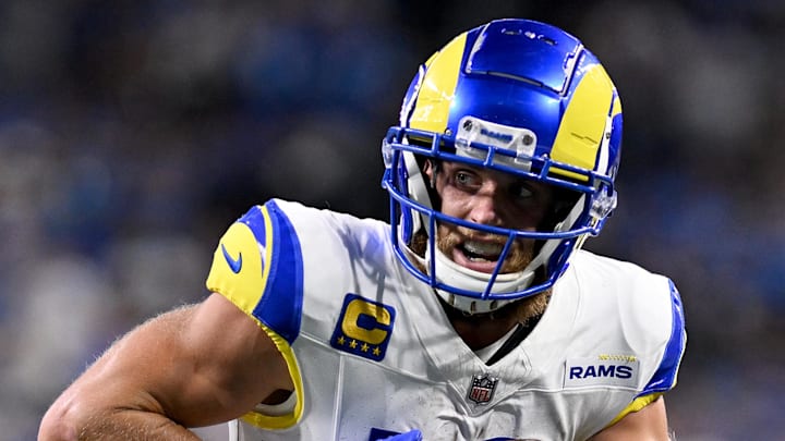 Sep 8, 2024; Detroit, Michigan, USA; Los Angeles Rams wide receiver Cooper Kupp (10) catches a pass and runs for a touchdown against the Detroit Lions in the fourth quarter at Ford Field. Mandatory Credit: Lon Horwedel-Imagn Images