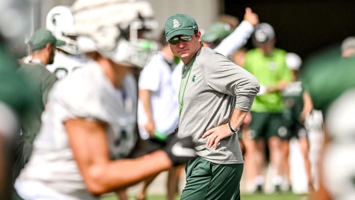 Michigan State's head coach Jonathan Smith looks on during the first day of football camp on Tuesday, July 30, 2024, in East Lansing.