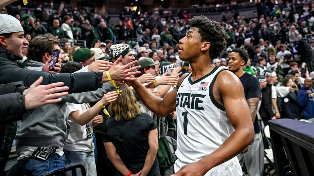 Michigan State's Jeremy Fears Jr. slaps hands with fans after the Spartans overtime win over Illinois on Saturday, Feb. 7, 2026, at the Breslin Center in East Lansing.