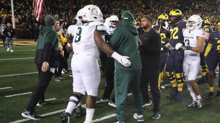 After the Michigan Wolverines beat the Michigan State Spartans, 29-7, to reclaim the Paul Bunyan Trophy, players from both teams had a shoving match on the Michigan Stadium field Saturday, October 29, 2022.

Msumich 102922 Kd 0017239