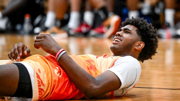 Michigan State freshman and Team Faygo's Jase Richardson reacts to a foul by Team Snipes in the game on Tuesday, June 25, 2024, during the Moneyball Pro-Am at Holt High School.