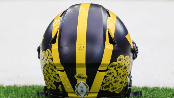 A Michigan football helmet on the sideline during open practice at NRG Stadium in Houston, Texas on Saturday, Jan. 6, 2024.