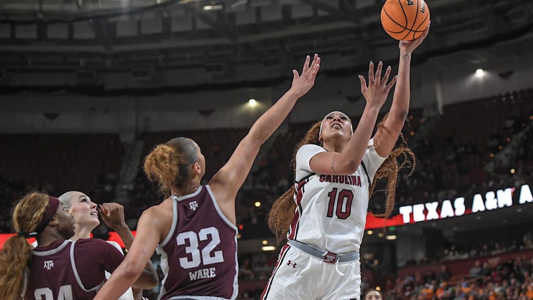 Mar 8, 2024; Greenville, SC, USA; South Carolina Gamecocks center Kamilla Cardoso (10) shoots the ball against Texas A&M Aggies forward Lauren Ware (32) during the third quarter at Bon Secours Wellness Arena. Mandatory Credit: Ken Ruinard/The Greenville News via USA TODAY NETWORK Mar 8, 2024; Greenville, SC, USA; South Carolina Gamecocks center Kamilla Cardoso (10) shoots the ball against Texas A&M Aggies forward Lauren Ware (32) during the third quarter at Bon Secours Wellness Arena. Mandatory Credit: Ken Ruinard/The Greenville News via USA TODAY NETWORK