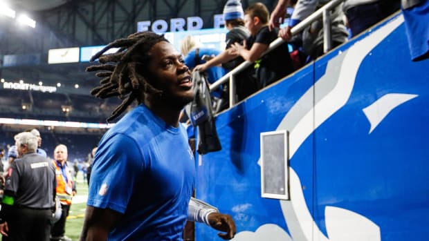 Detroit Lions quarterback Teddy Bridgewater (10) runs off the field after 42-17 win over the Denver Broncos at Ford Field