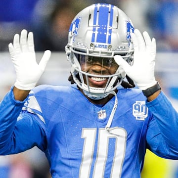 Detroit Lions quarterback Teddy Bridgewater waves to fans during warmups before the Denver Broncos game at Ford Field in Detroit on Saturday, Dec. 16, 2023.
