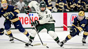 Michigan State's Isaac Howard moves the puck against Notre Dame during the second period in the Big Ten tournament on Saturday, March 15, 2025, at Muni Arena in East Lansing.