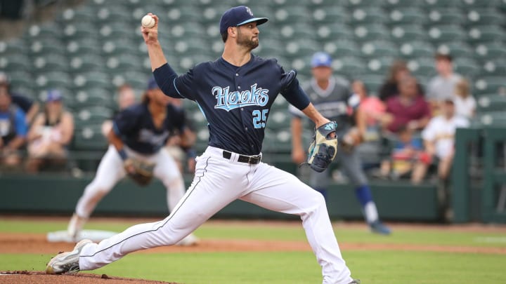 Blair Henley pitches for the Hooks during the exhibition game against Texas A&M-Kingsville at Whataburger Field on April 4, 2023, in Corpus Christi, Texas.