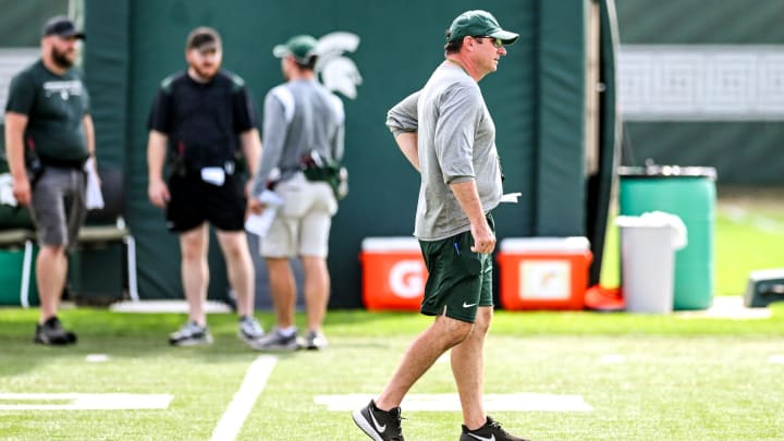 Michigan State's head coach Jonathan Smith watches over the action during the first day of football camp on Tuesday, July 30, 2024, in East Lansing.