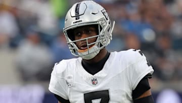 Nov 30, 2025; Inglewood, California, USA; Las Vegas Raiders quarterback Geno Smith (7) during the first half at SoFi Stadium. Mandatory Credit: Kiyoshi Mio-Imagn Images