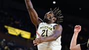 Nov 3, 2025; Ann Arbor, Michigan, USA; Michigan Wolverines forward Morez Johnson Jr. (21) shoots a layup against Oakland Golden Grizzlies in the second half at Crisler Center. Mandatory Credit: Lon Horwedel-Imagn Images