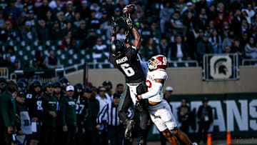 Michigan State's Nick Marsh, left, makes a catch as Indiana's Terry Jones Jr. defends during the first quarter on Saturday, Nov. 2, 2024, at Spartan Stadium in East Lansing.