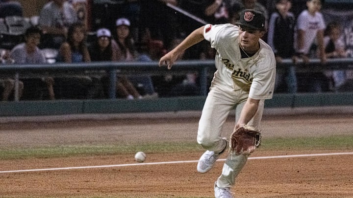 Visalia Rawhide's Gavin Conticello fields a hit ball Tuesday, April 11, 2023 during their home opener against the Rancho Cucamonga Quakes.

0411 Bb Rc Rawhide 8321t