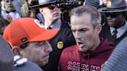Nov 30, 2024; Clemson, South Carolina, USA; Clemson head coach Dabo Swinney and South Carolina Head Coach Shane Beamer talk after the game at Memorial Stadium. Mandatory Credit: Ken Ruinard-Imagn Images