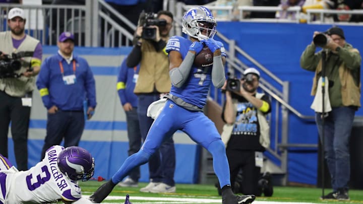 Lions wide receiver DJ Chark catches a touchdown pass against Vikings cornerback Cameron Dantzler Sr. during the first half on Sunday, Dec. 11, 2022, at Ford Field.