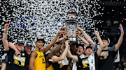 The Iowa Hawkeyes celebrate after defeating the Purdue Boilermakers, 75-66, to earn the Big Ten men's championship title Sunday, March 13, 2022, at Gainbridge Fieldhouse in Indianapolis.

Iowa Hawkeyes Versus Purdue Boilermakers In Big Ten Men S Championship Title Game On Sunday March 13 2022 At Gainbridge Fieldhouse In Indianapolis