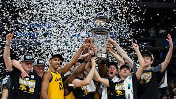 The Iowa Hawkeyes celebrate after defeating the Purdue Boilermakers, 75-66, to earn the Big Ten men's championship title Sunday, March 13, 2022, at Gainbridge Fieldhouse in Indianapolis.

Iowa Hawkeyes Versus Purdue Boilermakers In Big Ten Men S Championship Title Game On Sunday March 13 2022 At Gainbridge Fieldhouse In Indianapolis