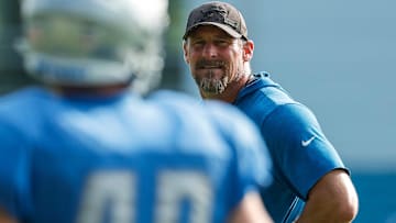 Detroit Lions head coach Dan Campbell watches practice during training camp at the team's facility in Allen Park, Friday, Aug. 6, 2021.