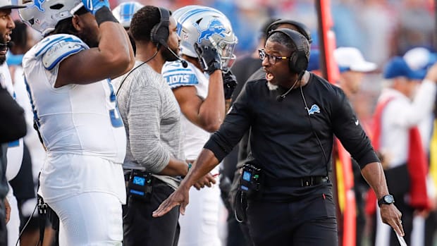 Lions defensive coordinator Aaron Glenn reacts to a play against the 49ers 